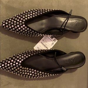 Never worn studded shoes